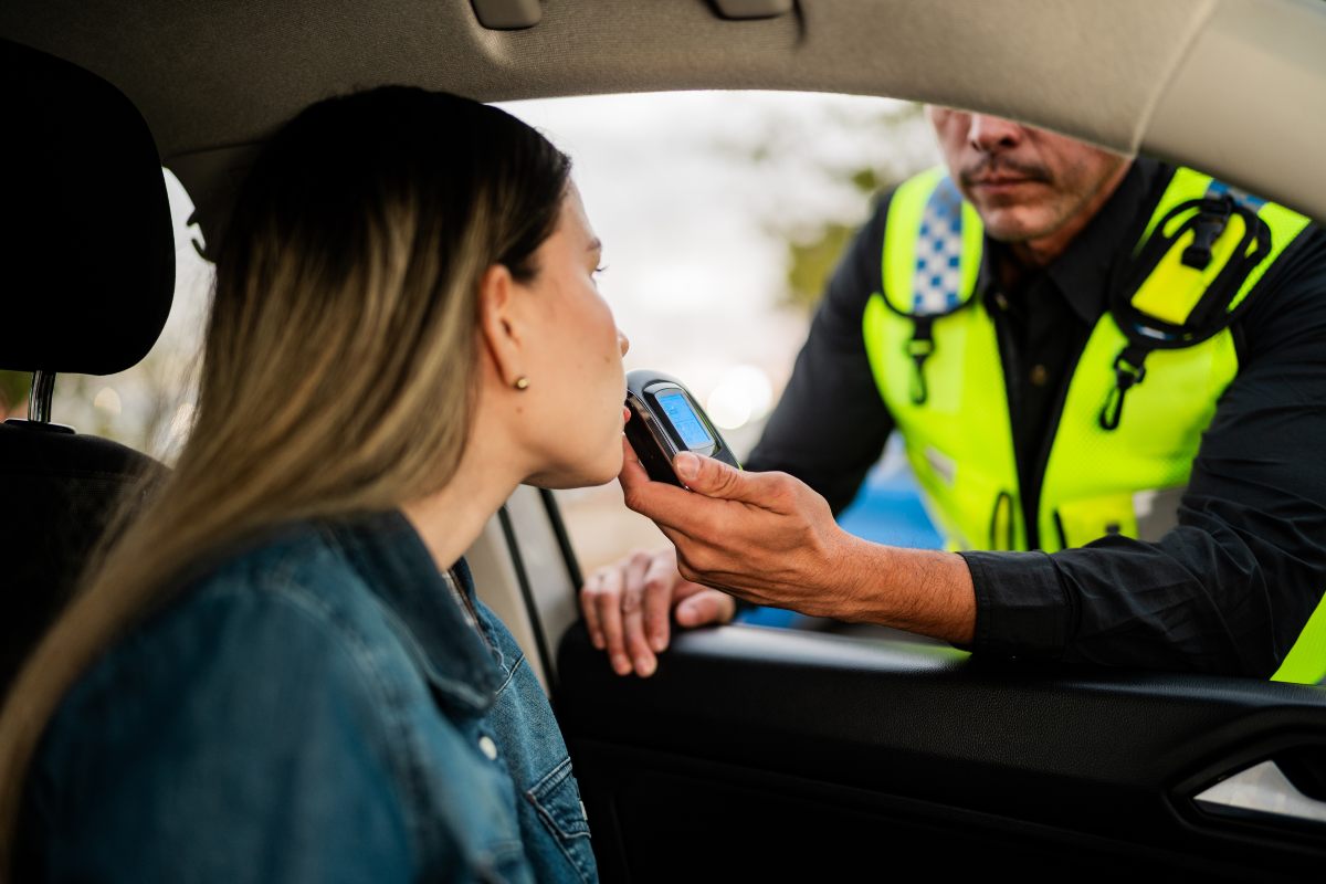 police officer taking drink and drive test